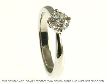 Platinum engagement ring incorporating customer''s own brilliant cut diamond.