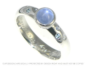 Bespoke star sapphire ring with scatter set shoulders