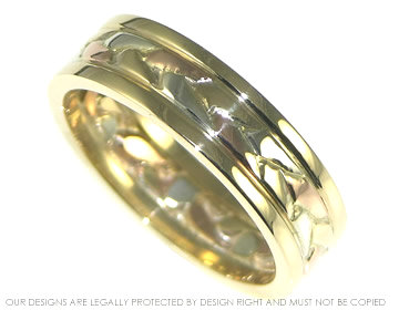 9ct yellow, white and rose gold celtic wedding band between yellow gold borders. 