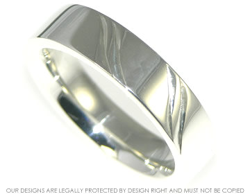 Bespoke sterling silver wedding band with engraved detailing