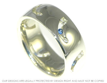 Bepoke 9ct white gold eternity ring with sapphires and diamonds.