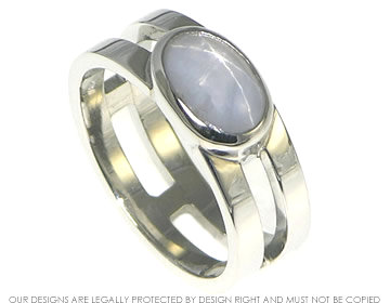 Bespoke platinum engagment / wedding ring with grey star sapphire