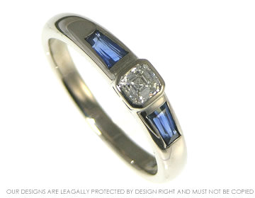 18ct white gold engagement ring with asscher cut 0.31ct diamond and two tapered baguette sapphire