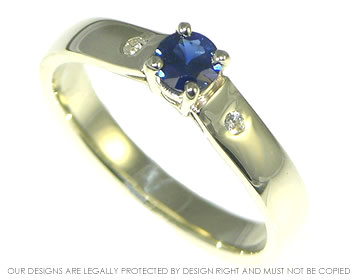 9ct white gold engagement ring with 0.26ct deep blue sapphire and diamonds