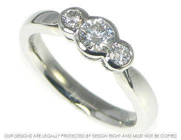 Platinum 0.54cts engagement ring with 3 brilliant cut diamonds