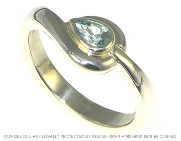 9ct white gold and aquamarine Indonesian inspired engagement ring.