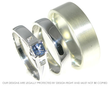 Pair of white gold wedding bands.