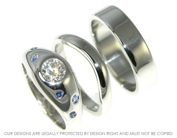 Pair of Platinum wedding bands.