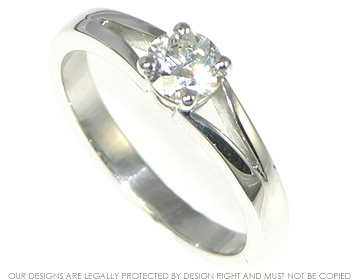 9ct white gold engagement ring with split shoulders and a diamond. 