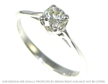 9ct white gold engagement ring with customers own brilliant cut diamond.