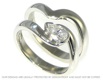 Bespoke platinum shaped wedding ring