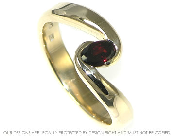 9ct yellow gold ring with a deep red oval 0.57ct garnet