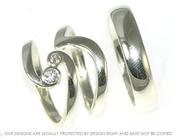 Pair of commissioned 9ct white gold wedding bands 