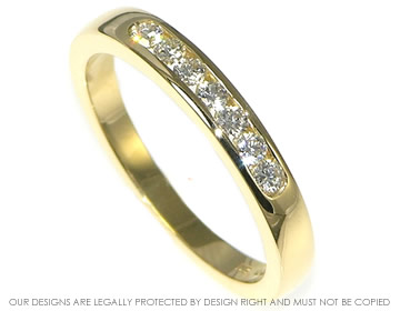 18ct yellow gold eternity ring with brilliant cut H SI diamonds