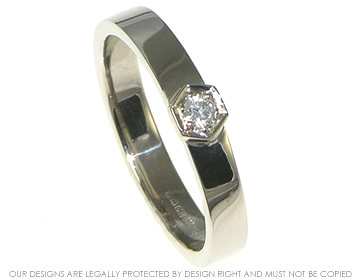 Hexagonal shaped 18ct white gold engagement ring with 2.5mm brilliant cut diamond