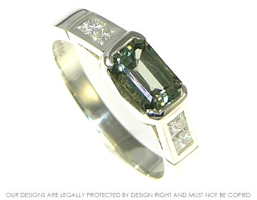 9ct white gold engagement ring with 0.87ct green sapphire and princess cut diamonds 