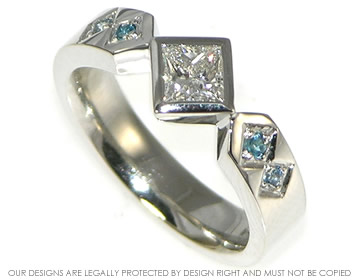 Bespoke platinum and diamond engagement ring with birthstones