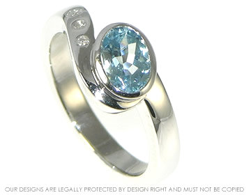 Bespoke platinum, aquamarine and diamond ocean inspired engagement ring 