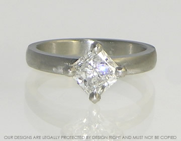 Platinum engagement ring using customer''s own 1.20cts D VS2 5.6mm princess cut diamond