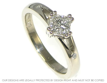 18ct white gold split shoulder engagement ring with a princess cut diamond.