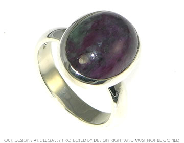 Sterling silver ring with oval cabochon cut Zoisite and ruby matrix.  