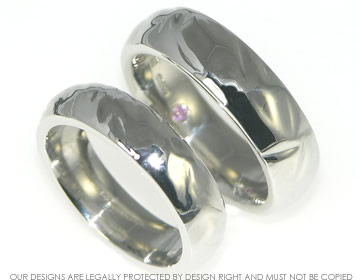 A platinum ripple effect commitment ring to work as one of a pair 