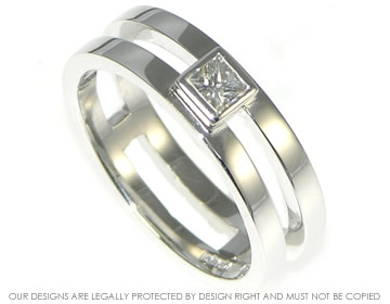 18ct white gold 
Maze inspired white gold diamond engagement ring.