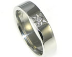 platinum ring with a star set brilliant cut diamond