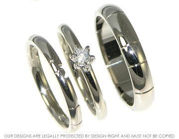 Bespoke pair of 18ct white gold wedding rings with engraved lines