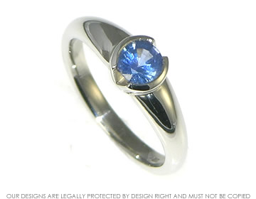 Platinum engagement ring with 0.43ct blue sapphire 