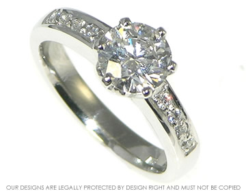 Platinum engagement ring with brilliant cut diamonds