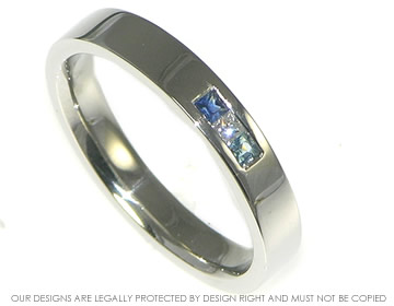 Bespoke platinum wedding ring with sapphire, diamond and aquamarine