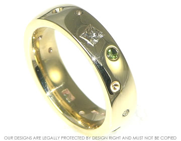 Bespoke 9ct yellow gold eternity ring with diamonds and green stones