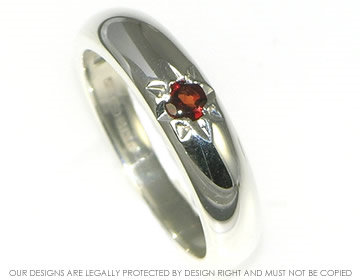 Silver and garnet dress ring  