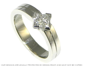 Platinum engagement ring with princess cut diamond