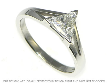 Mountain inspired trilliant cut diamond platinum engagement ring