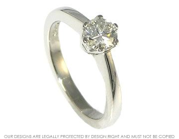 Platinum engagement ring incorporating customer's own  diamond.