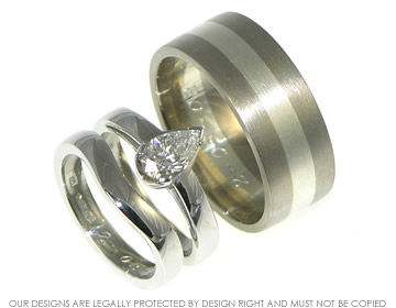 A pair of bespoke platinum and white gold wedding rings. 