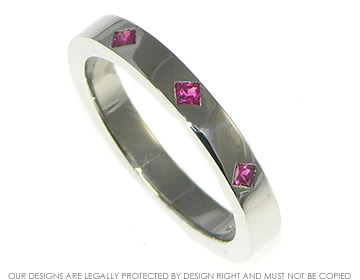 Bespoke platinum and ruby eternity ring 