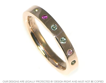 Bespoke 9ct rose gold ring with six brilliant cut birthstones 