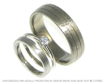 Pair of bespoke wedding rings with engraved lines