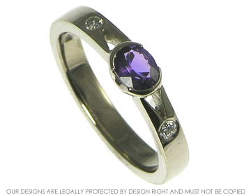 18ct white gold engagement ring with purple sapphire and diamonds