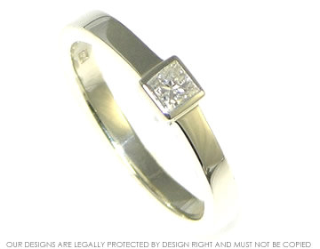 9ct white gold and princess cut diamond solitaire engagment ring