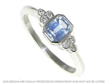 18ct white gold engagement ring with emerald cut sapphire 