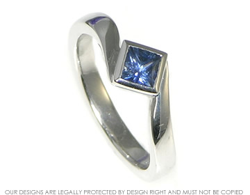 9ct white gold engagement ring with a blue sapphire 