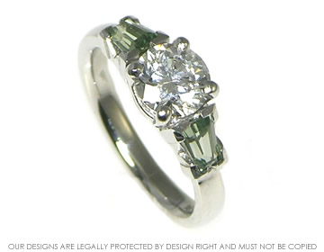 Bespoke platinum, diamond and green sapphire engagement ring