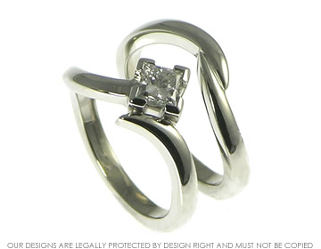 Platinum asymmetic engagement ring with princess cut G VS 0.43ct 4mm diamond with platinum shaped and fitted wedding ring