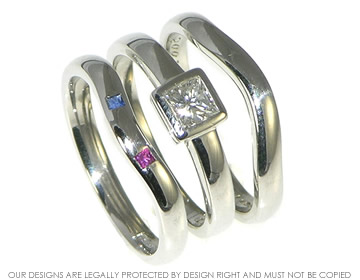 Bespoke platinum and sapphire shaped eternity ring.