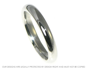 Platinum  3mm classic courting profile wedding band. 