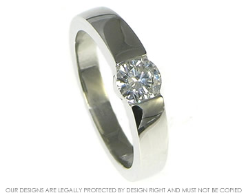 Platinum tension set look H SI diamond engagement ring.